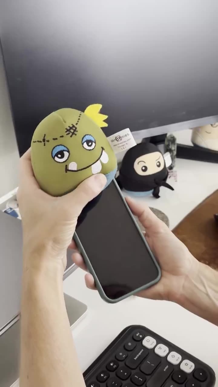 Zombie cleaning a phone screen